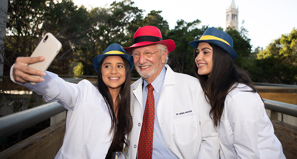 students celebrate with Dr. Herbie