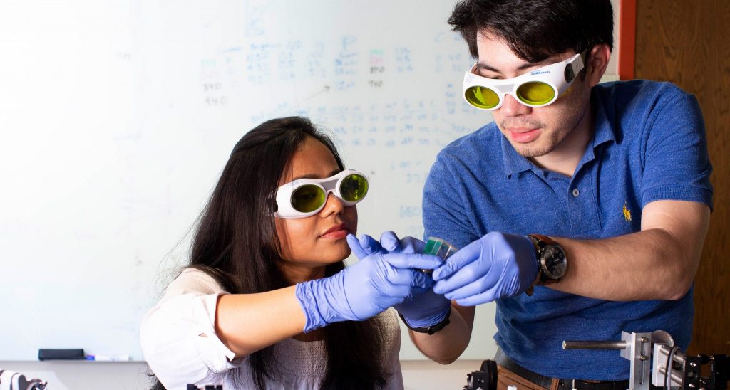 Two student researchers working in the Roorda Lab.